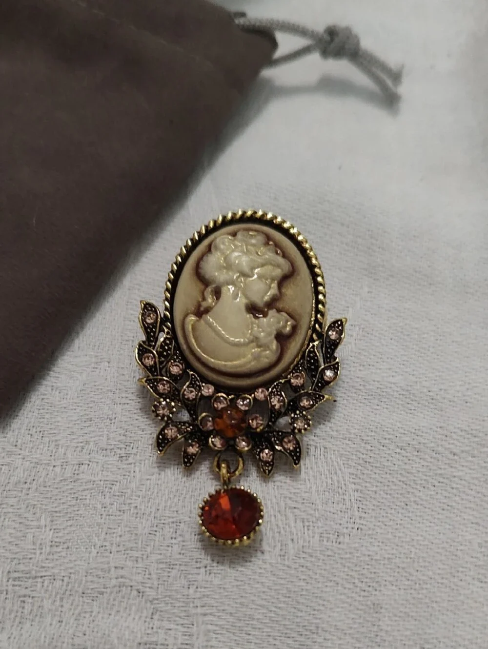 Source Unknown Gold-Tone Cream Cameo Brooch with Amber Drop